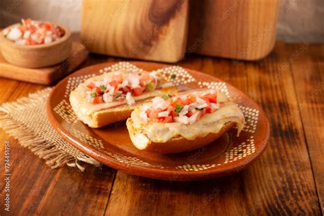 Molletes Mexican Recipe Based On Bolillo Bread Split Lengthwise