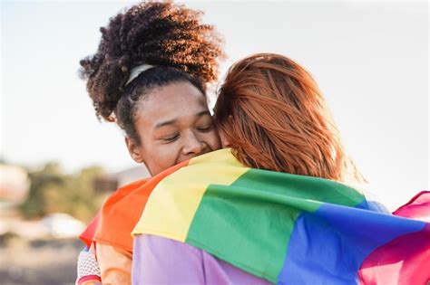 Premium Photo Lesbian Couple Hugging Together At Gay Pride Parade