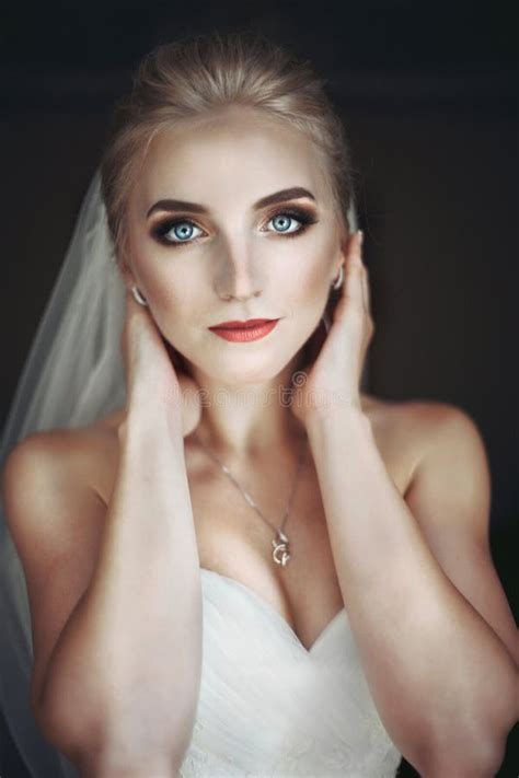 Beautiful Innocent Brunette Bride In White Dress Posing Near Church Wall Stock Photo Image Of