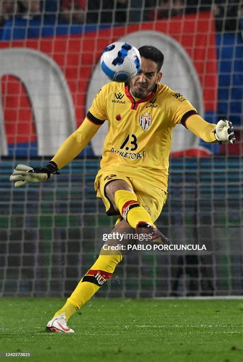 brazils atletico goianiense goalkeeper ronaldo de oliveira clears