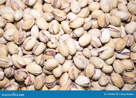 Roasted And Salted Pistachios In Shell Food Background Stock Photo