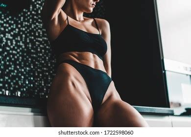 Brunette Woman Black Bikini Posing Kitchen Stock Photo