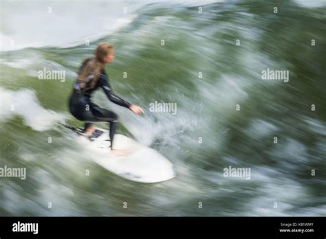Germany Bavaria Munich English Garden Ice Brook Wave Surfer Stock