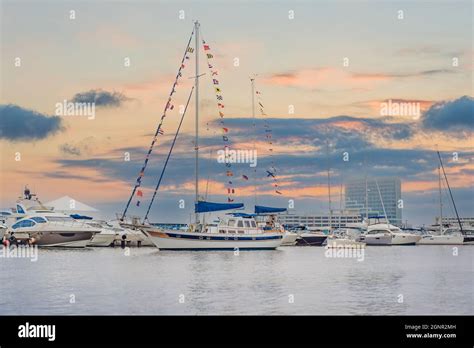 Yacht Sailing Against Sunset Holiday Lifestyle Landscape With Skyline