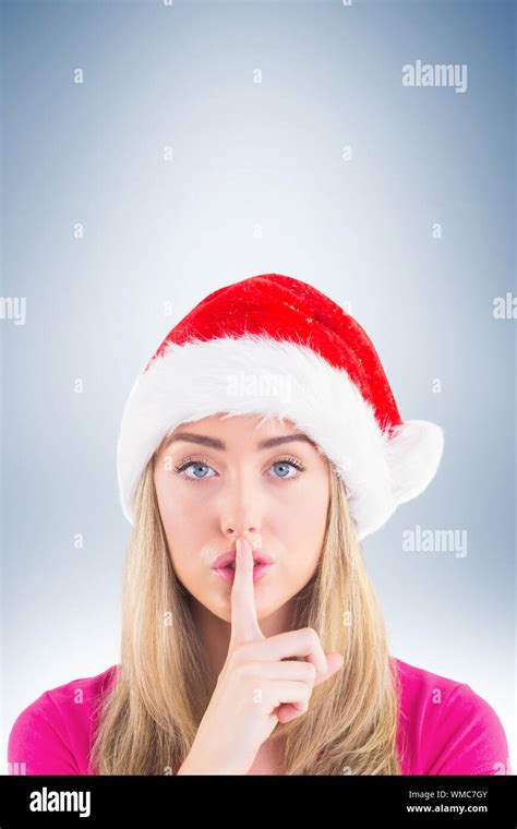Festive Blonde Making Quiet Sign On Vignette Background Stock Photo Alamy