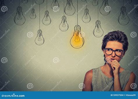 Woman With Glasses Thinking Hard Looking For Right Solution Stock Photo