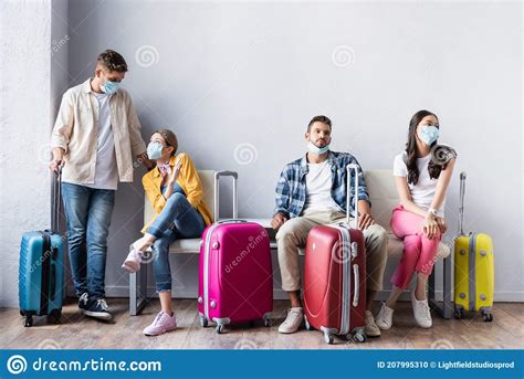 Four Multicultural People Waiting In Hall Stock Photo Image Of Women