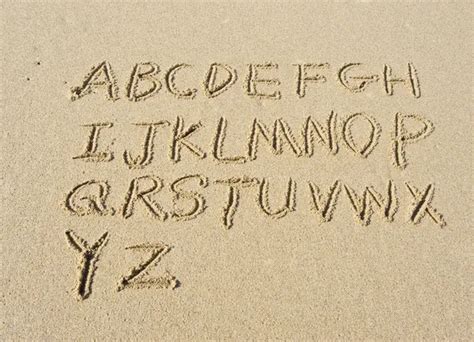 Fotos De Letras Na Areia Imagens De Letras Na Areia Sem Royalties