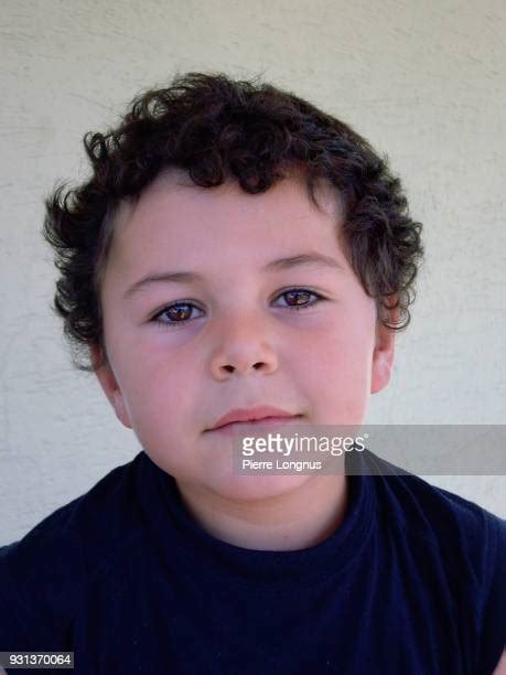 72 Portrait Of Smiling Boy With Curly Brown Hair Stock Photos High Res