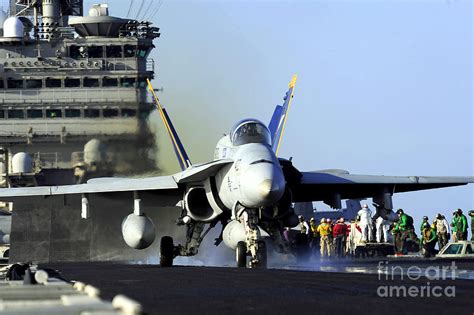 An Fa 18c Hornet Launches Photograph By Stocktrek Images Pixels