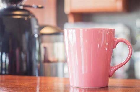 Pink coffee mug in a cafe 1759021 Stock Photo at Vecteezy