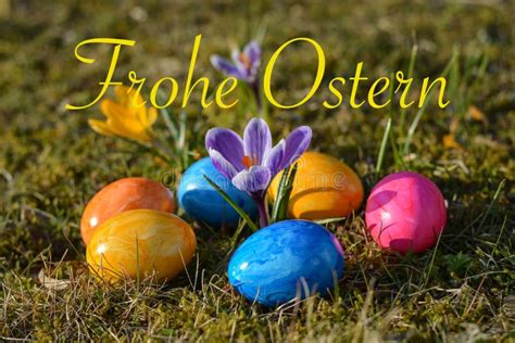 Happy Easter In German With Several Colorful Easter Eggs Lying O Stock