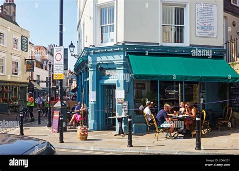 People eating outside at Fagin's restaurant, on the corner of George ...