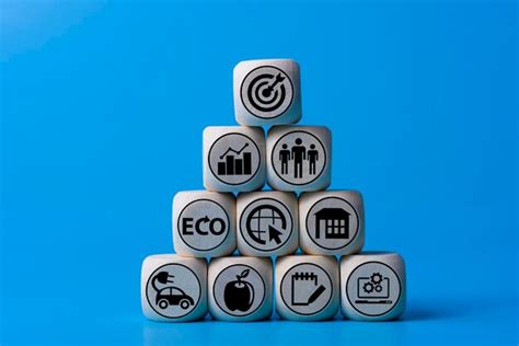 Premium Photo | Goal achievement concept with icons on wooden cubes ...