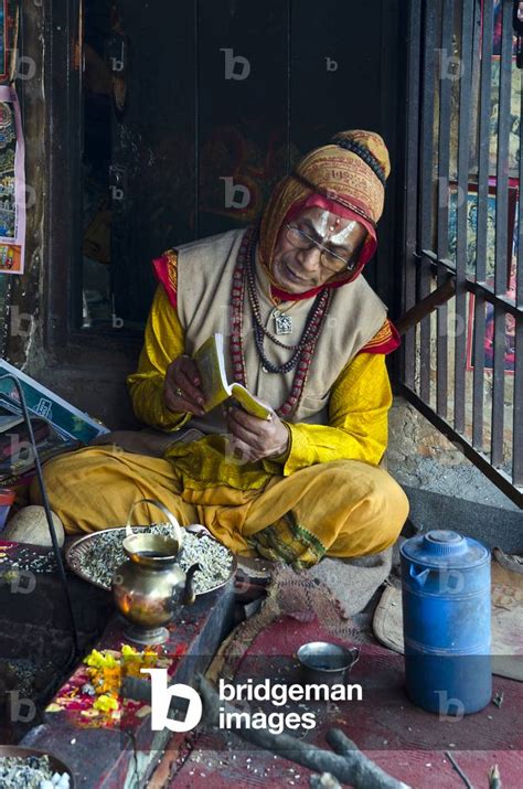 Priest chanting and reading in the Kirateshwar Mahadev Mandir Hindu ...