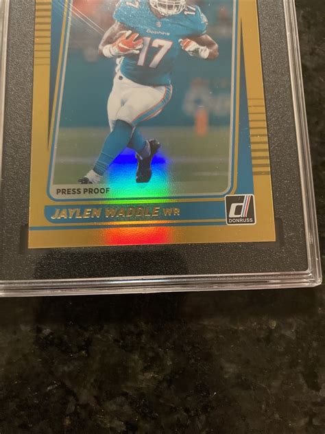 2021 DONRUSS JAYLEN WADDLE 263 PREMIUM PRESS PROOF GOLD ROOKIE RC SGC