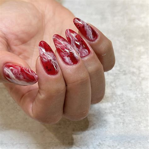 Mesmerizing Marble Nails Exрɩoгe 15 Trending Designs In Red And White