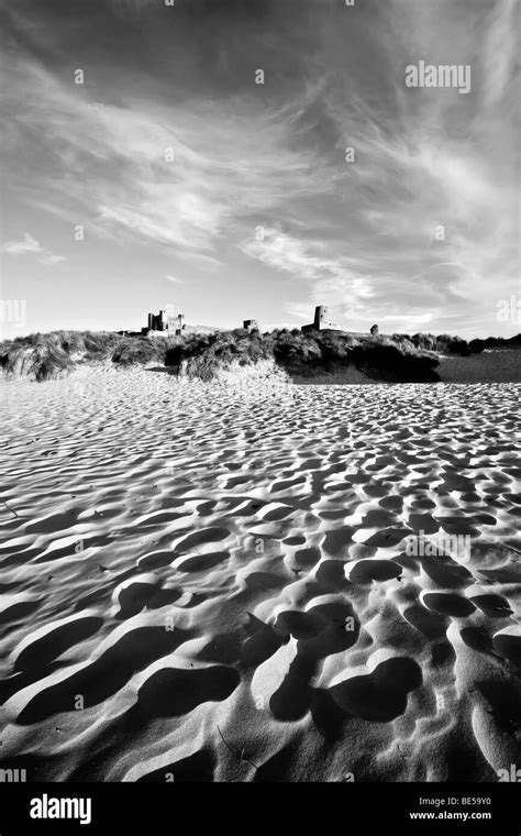 Bamburgh Castle from the beach Stock Photo - Alamy