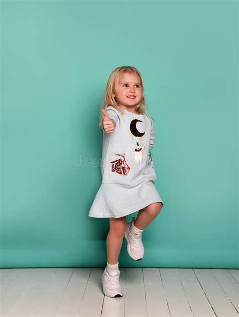 Happy Child Girl With Hands Thumbs Up Stock Photo Image Of Girl