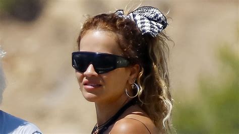 Rita Ora Shows Off Her Incredible Figure In A Black Bikini As She Soaks Up The Sun In Ibiza With