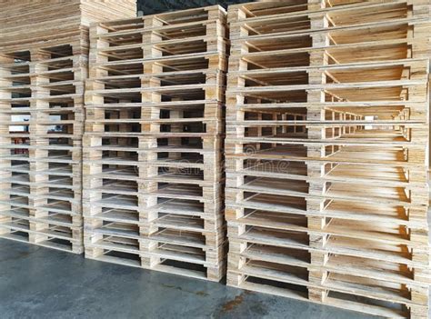 Stack of Wooden Pallets in Warehouse Storage. Stock Image - Image of ...