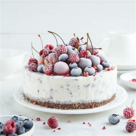 Berry Ice Cream Cake Served With Frozen Berries Stock Photo - Image of ...