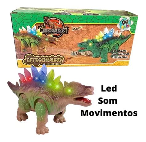 Dinossauro De Brinquedo Anda Emite Som Luz Led Estegossauro