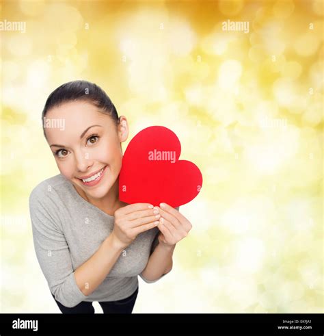 smiling asian woman with red heart Stock Photo - Alamy