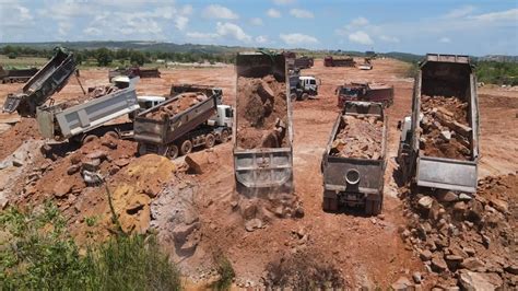 Part Most Hardly Komatsu Dozers And Dump Trucks Filling Stone