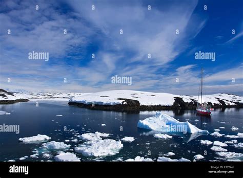 Yacht Sailing Among The Glaciers In Antarctica Stock Photo Alamy