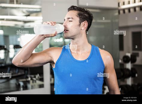 Handsome Man Drinking Water Stock Photo Alamy