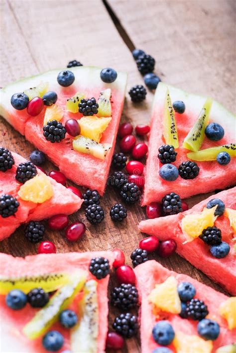 Colorful Tropical Fruit Watermelon Pizza Topped With Kiwifruit Stock