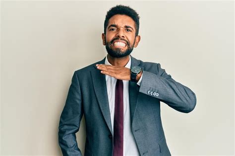 Premium Photo Handsome Hispanic Man With Beard Wearing Business Suit