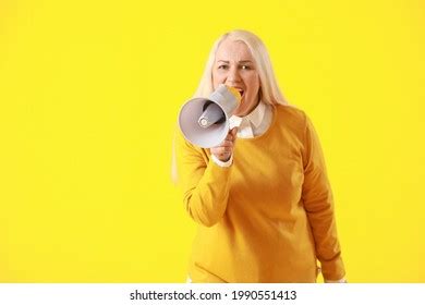 Upset Redheaded Mature Woman Yelling Using Stock Photo