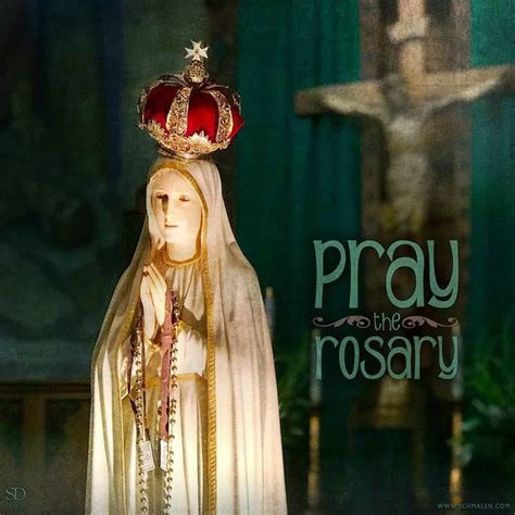 A Statue Of Mary Wearing A Crown With The Words Pray To The Rosary On It