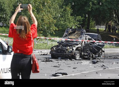 Kiev Ukraine 27th June 2017 A Woman Takes A Photo Of The Wreckage