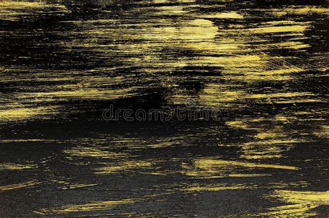 Brushstrokes of Gold Paint on a Black Background Stock Image - Image of ...