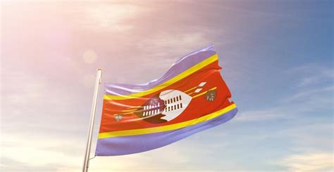 Premium Photo Swaziland National Flag Waving In Beautiful Sky