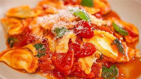 Spinach And Cheese Agnolotti With Tomato And Buffalo Mozzerella Sugo