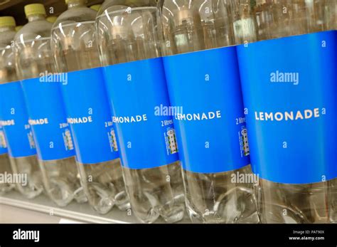 Plastic Lemonade Bottles On Supermarket Shelf Stock Photo Alamy