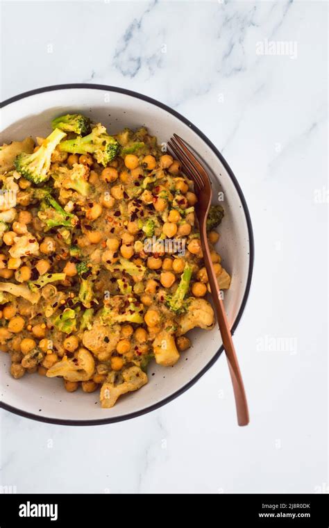 Vegan Spicy Chickpeas Broccoli And Cauliflower Stir Fry With Peanut Sauce Healthy Plant Based