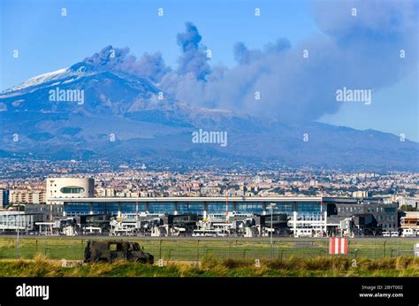 Airport Of Catania In Front Of A Live Eruption Of Mount Etna Sicily