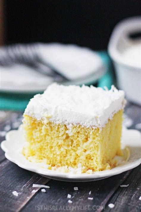 Coconut Poke Cake With Whipped Cream Frosting Half Scratched Recipe