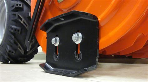 » How to Adjust Skid Shoes on a Snow Blower