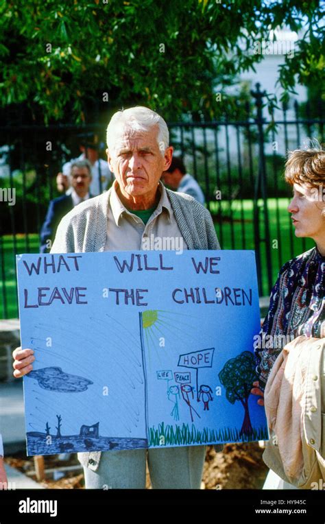 Phillip Berrigan Holding A Sign Prior To Being Arrested For Not Having