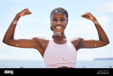 Strong Black Woman Flexing Arms Muscle And Body Power Fitness And