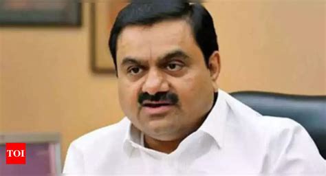 Adani Hikes Stake In Flagship Firm Times Of India