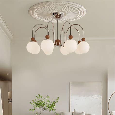 Contemporary Globe Chandelier With White Glass Shades And 1 Tier Design