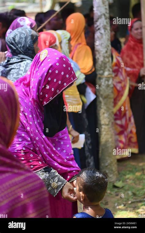 Muslim Voters Patiently Await Their Turn To Cast Their Votes At A