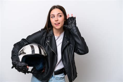 Chica Joven Con Un Casco De Motocicleta Aislado Sobre Fondo Blanco